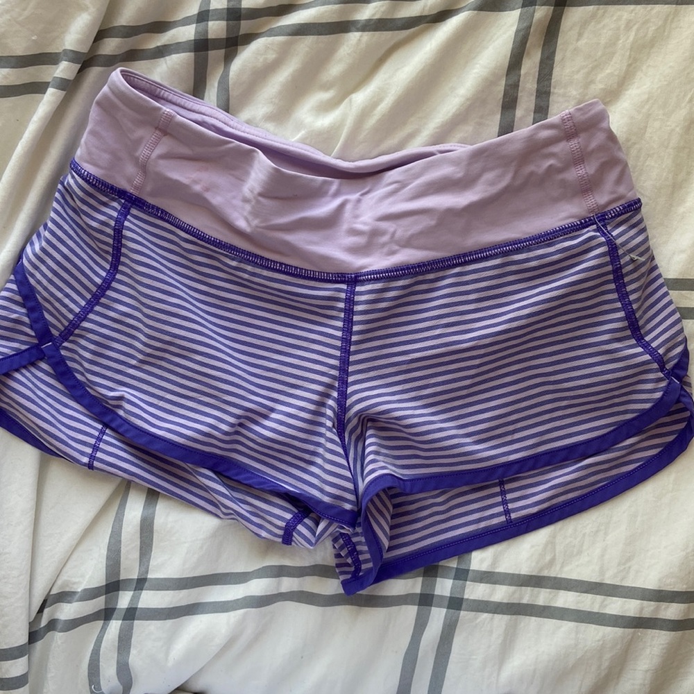 Lululemon speed up purple strip shots size:4 length: 2.5